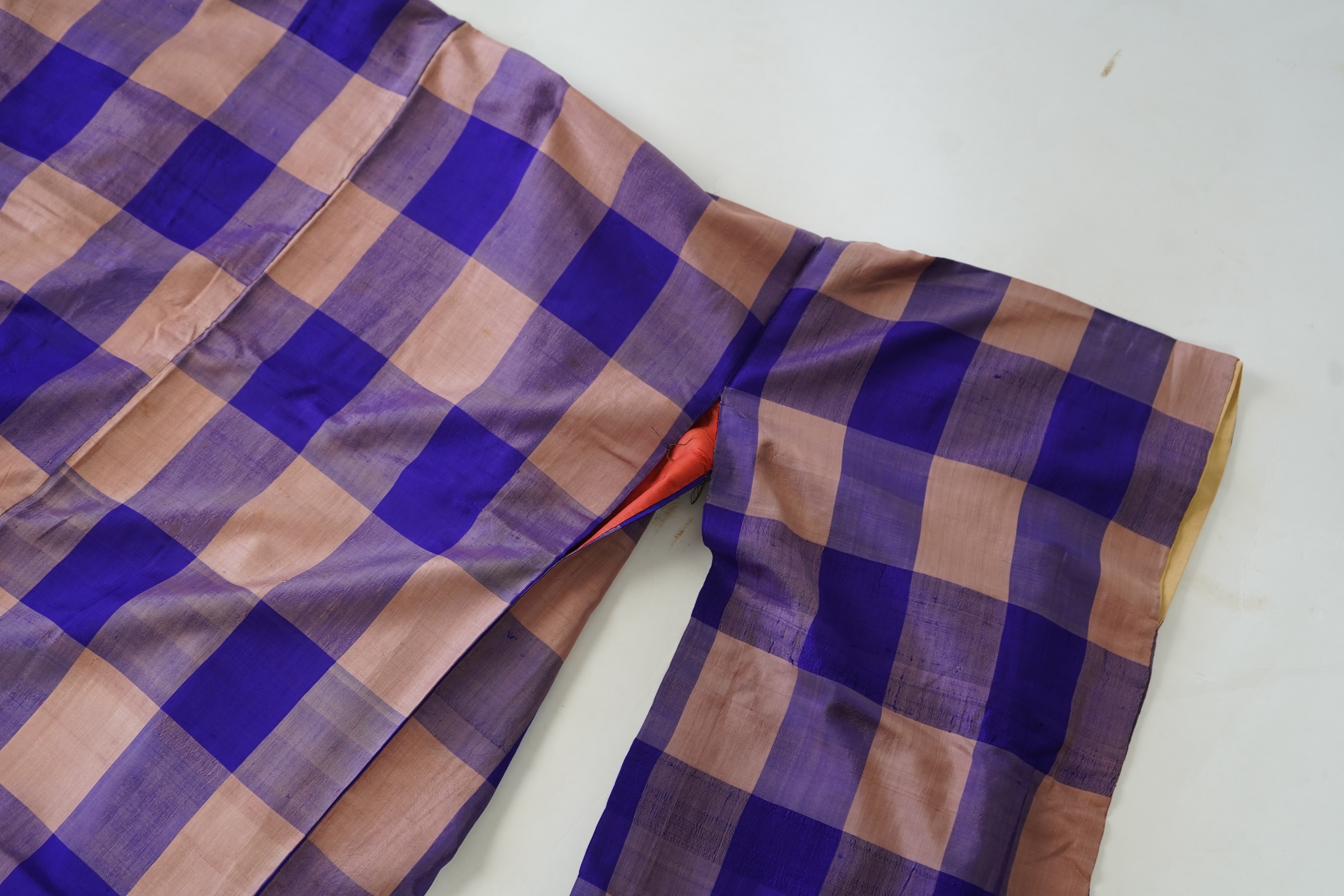 Four 1930’s - 1950’s printed silk full length silk lined Japanese kimonos. Two floral and two geometric in design. Longest black and orange floral designed kimono, 150cm long. Condition - purple and pink check kimono the